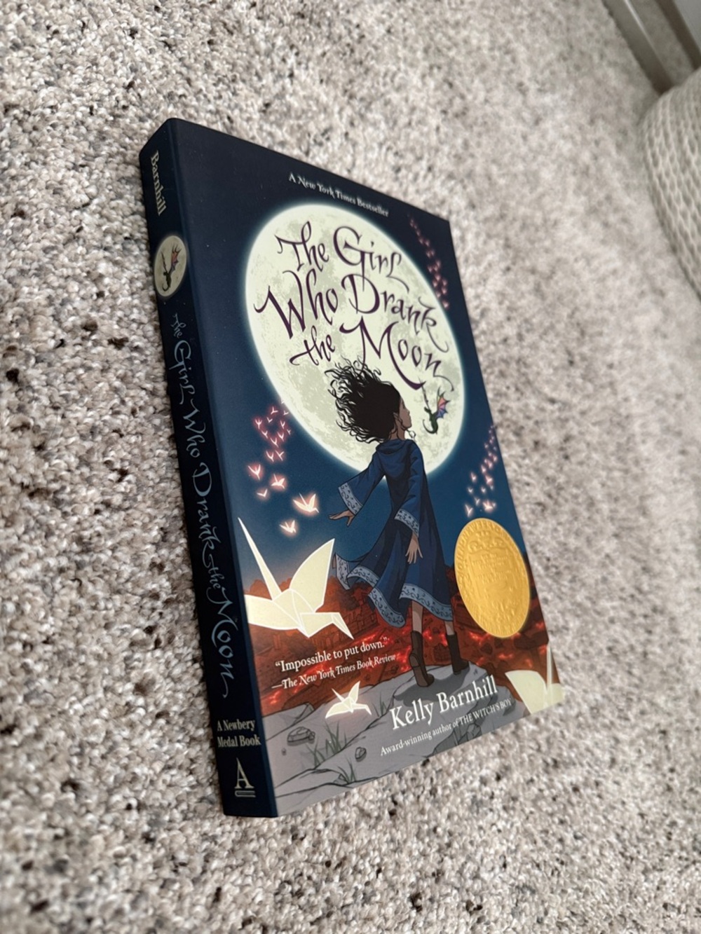 The Girl Who Drank the Moon by Kelly Barnhill - Navy & White Cover